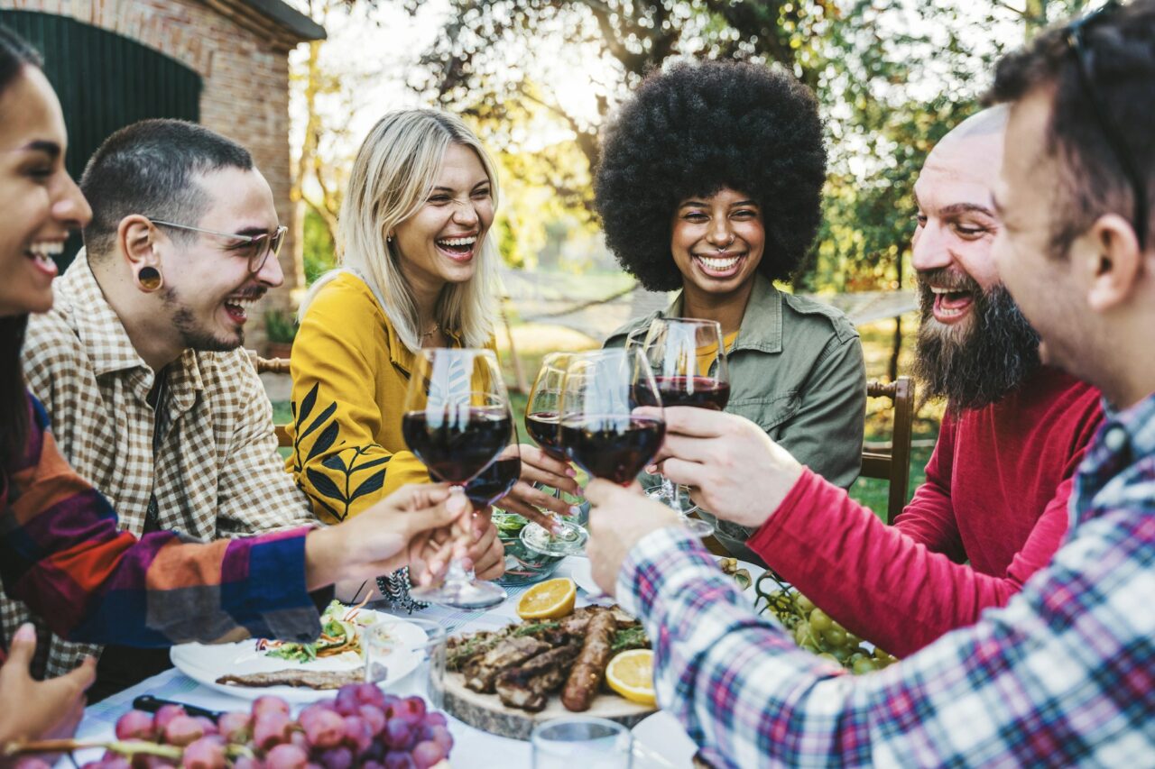 happy friends having bbq dinner party in restaurant garden 1